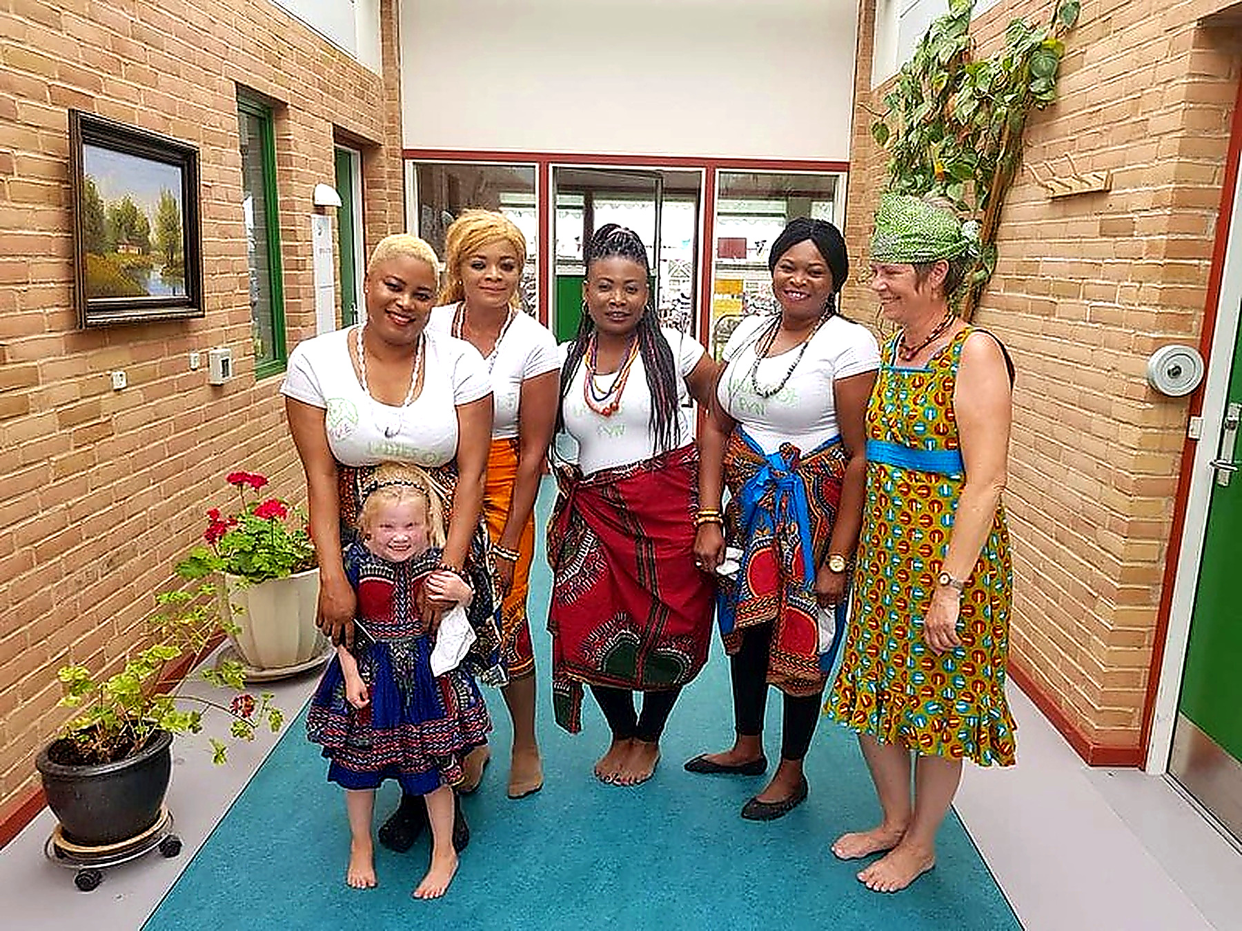 Participants wearing African cultural clothing